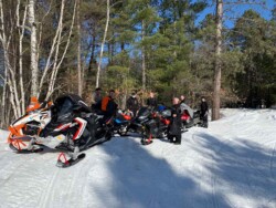 Winter Vacation Activities: Snowmobiling